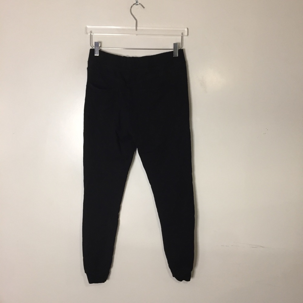 Pam & Gela Black Distressed Pants. Size Small